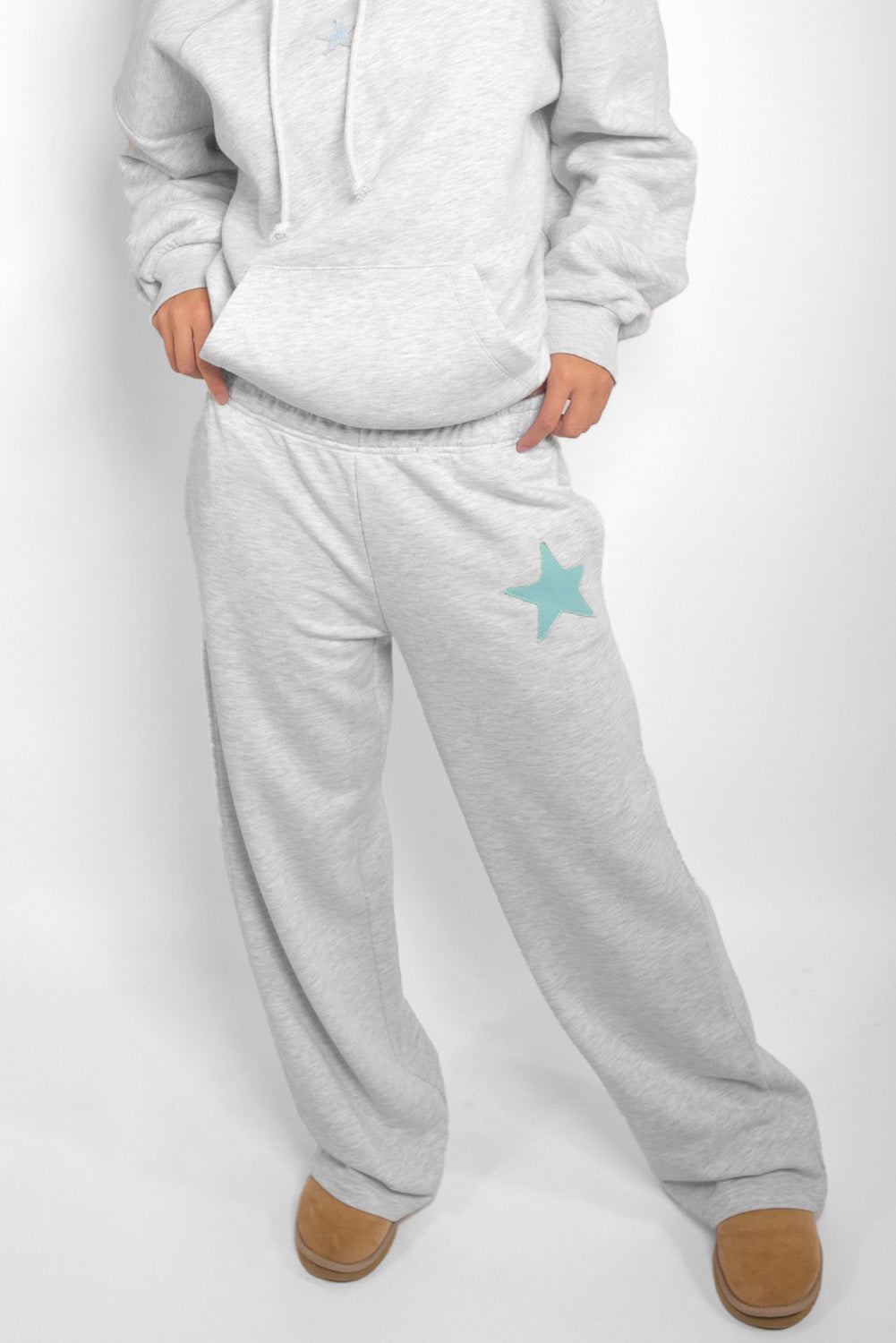 Wide-leg joggers with star patch | Subdued