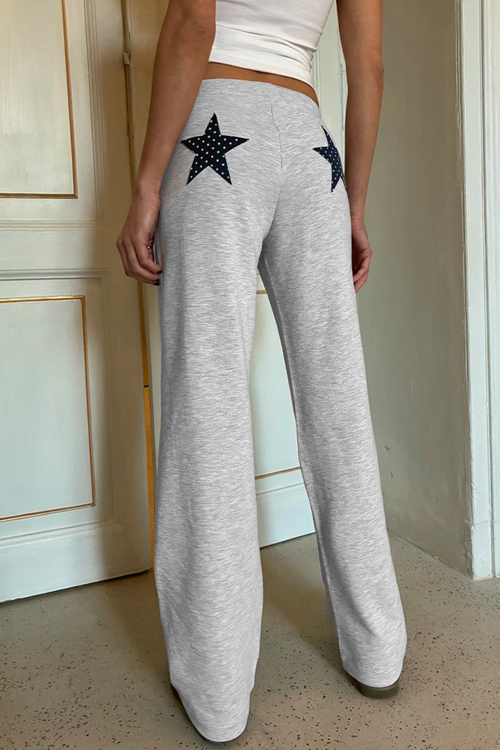 Wide-leg joggers with stars patch | Subdued