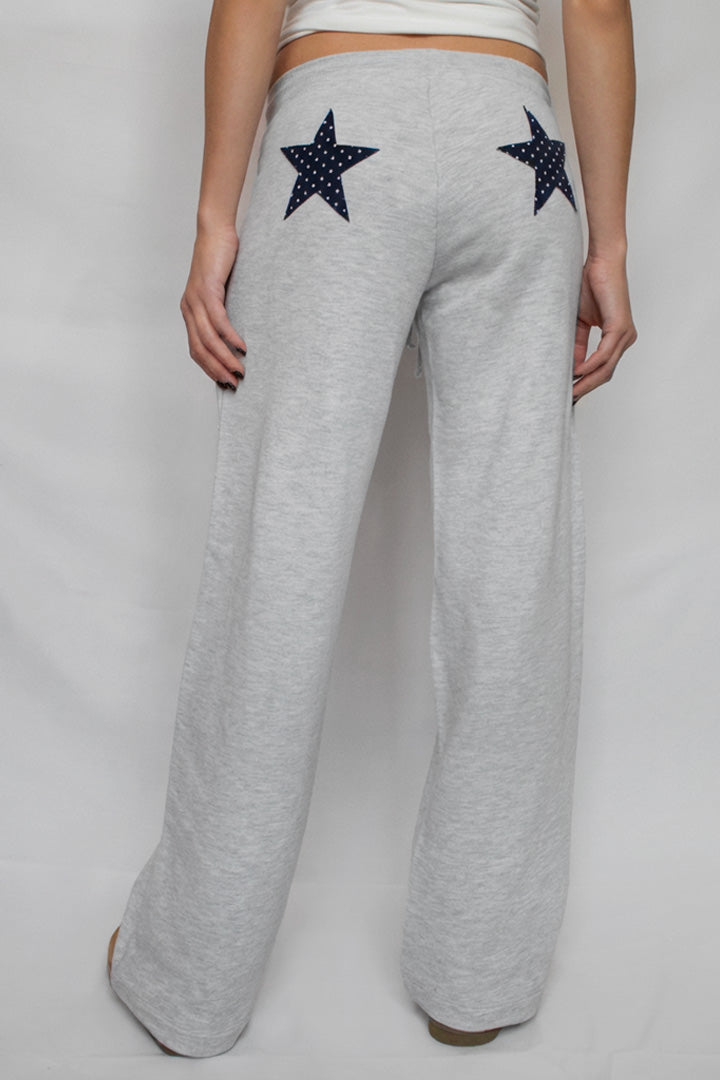 Wide-leg joggers with stars patch | Subdued